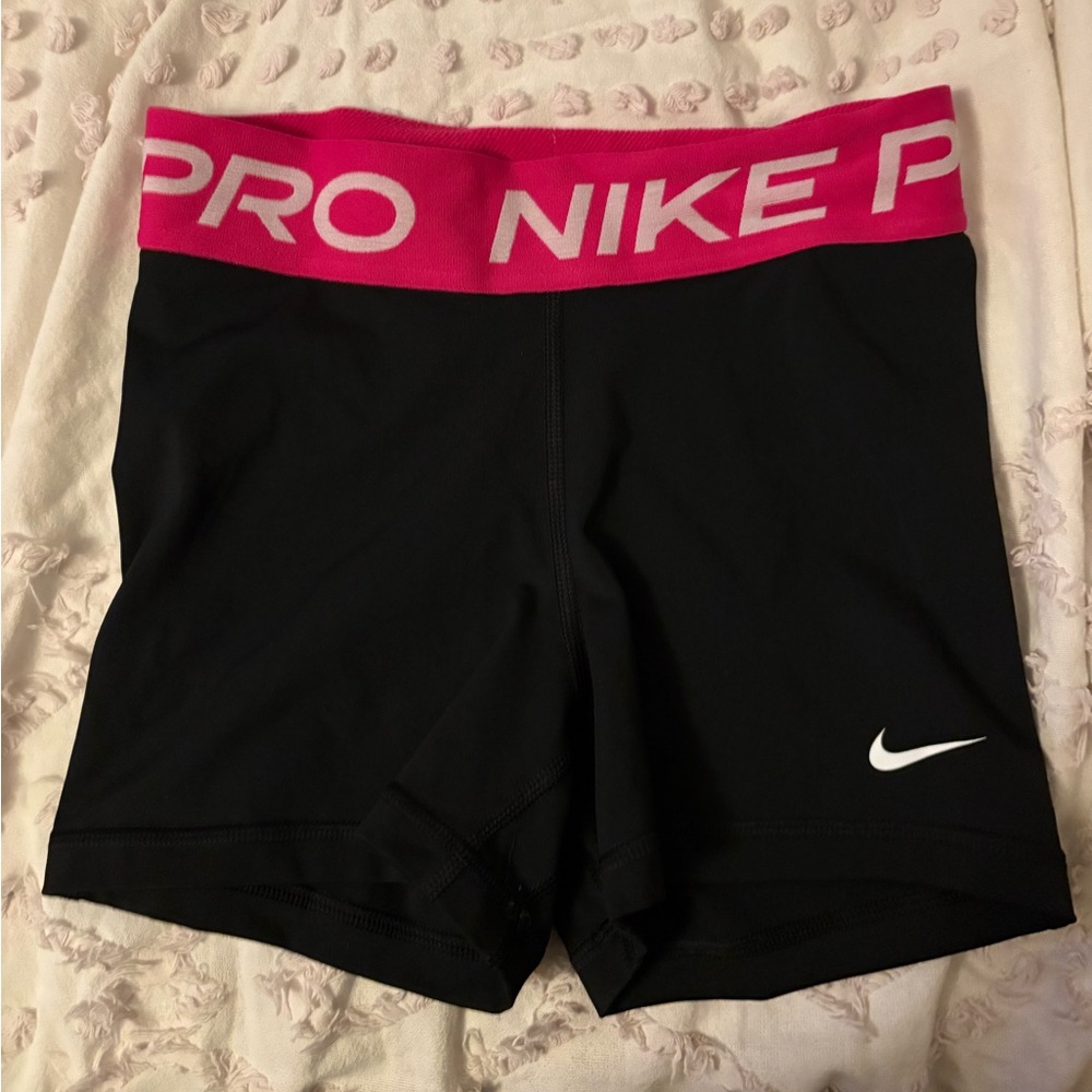 pink band nike pro shorts